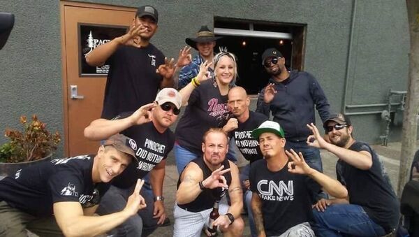 Patriot Prayer + Proud Boys in Vancouver night b4 Aug 4 Portland rally many fear will end in violence. Tusitala Tiny Toese and others make an apparent White Power hand gesture. T-shirts read, Pinochet Did Nothing Wrong. - Sputnik International