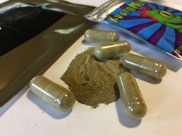 In this Sept. 27, 2017, file photo, kratom capsules are displayed in Albany, N.Y. Federal health authorities on Tuesday, Nov. 14, are warning about reports of injury, addiction and death with the herbal supplement that has been promoted as an alternative to opioid painkillers and other prescription drugs. In this Sept. 27, 2017, file photo, kratom capsules are displayed in Albany, N.Y. Federal health authorities on Tuesday, Nov. 14, are warning about reports of injury, addiction and death with the herbal supplement that has been promoted as an alternative to opioid painkillers and other prescription drugs. - Sputnik International