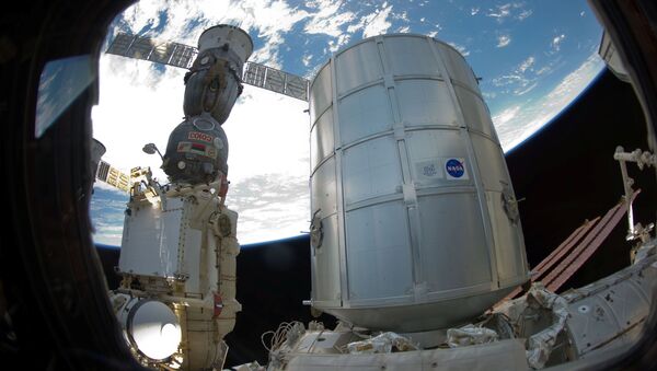 Permanent Multipurpose Module (PMM) and a docked Russian Soyuz spacecraft - Sputnik International