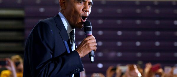 U.S. President Barack Obama greets supporters in an overflow room before he participates in a Get Out the Early Vote campaign event for Hillary Clinton in Columbus, Ohio, U.S., November 1, 2016 - Sputnik International
