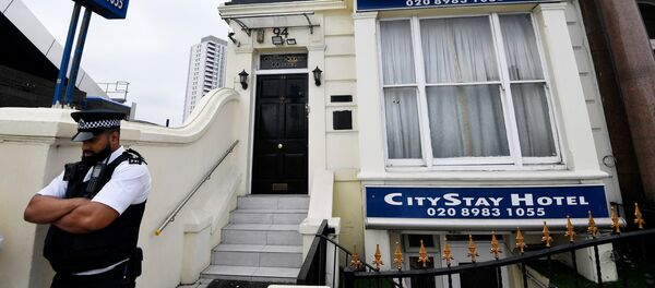 A police officer stands outside the City Stay Hotel used by Alexander Petrov and Ruslan Boshirov; who have been accused of attempting to murder former Russian spy Sergei Skripal and his daughter Yulia; in London, Britain September 5, 2018 - Sputnik International