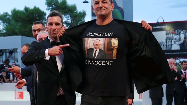 The 75th Venice International Film Festival - Screening of the film Suspiria competing in the Venezia 75 section - Red Carpet Arrivals - Venice, Italy, September 1, 2018 - Luciano Silighini Garagnani wears a T-shirt with a sign reading: Weinstein is innocent. - Sputnik International