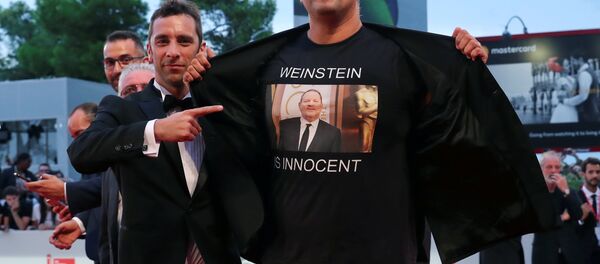 The 75th Venice International Film Festival - Screening of the film Suspiria competing in the Venezia 75 section - Red Carpet Arrivals - Venice, Italy, September 1, 2018 - Luciano Silighini Garagnani wears a T-shirt with a sign reading: Weinstein is innocent. The 75th Venice International Film Festival - Screening of the film Suspiria competing in the Venezia 75 section - Red Carpet Arrivals - Venice, Italy, September 1, 2018 - Luciano Silighini Garagnani wears a T-shirt with a sign reading: Weinstein is innocent. - Sputnik International