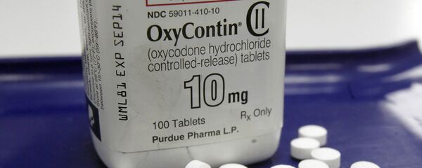 OxyContin pills arranged for a photo at a pharmacy. OxyContin pills arranged for a photo at a pharmacy. - Sputnik International