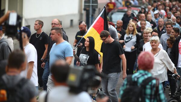 People attend a right wing protest in Koethen, Germany, September 9, 2018, after a 22-year-old German man died overnight in the eastern town of Koethen and two Afghans have been detained on suspicion of killing him. - Sputnik International
