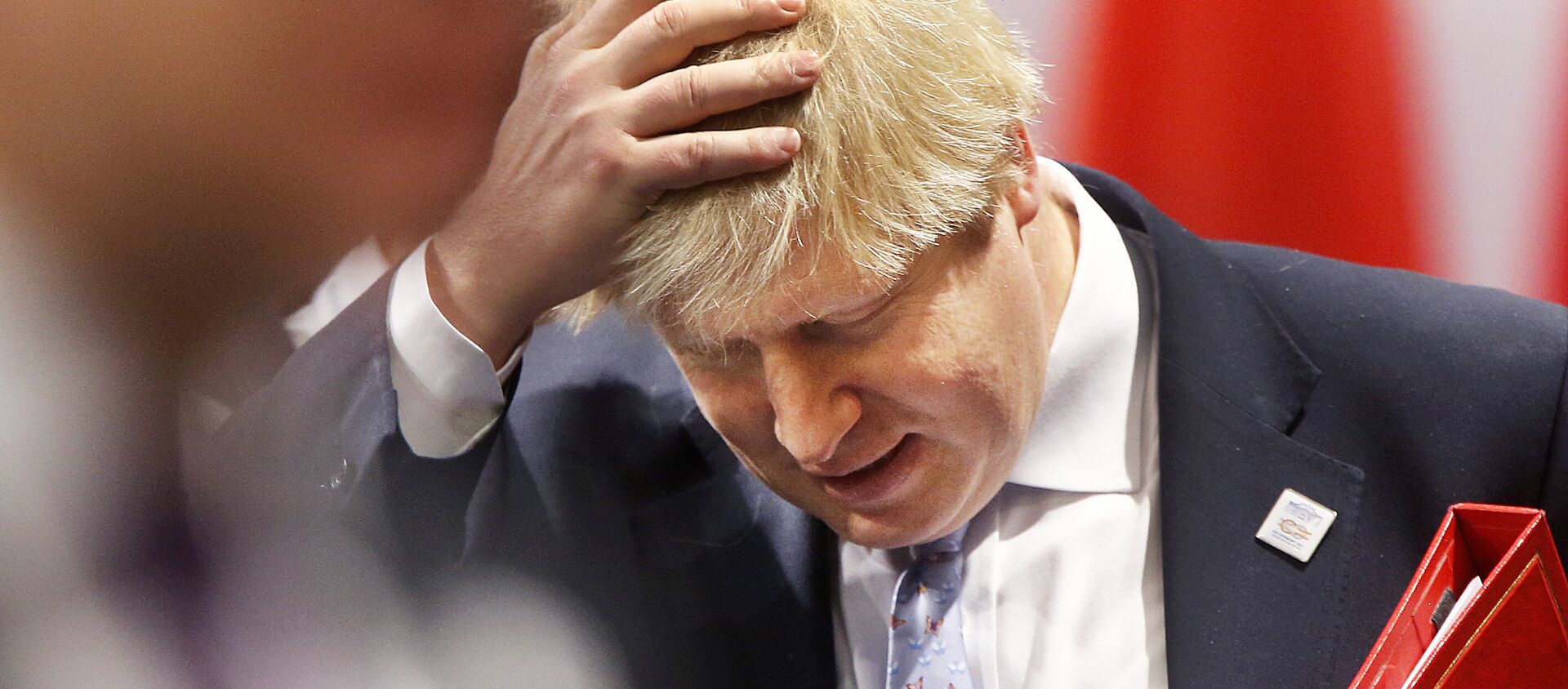 Britain's Prime Minister Boris Johnson adjusts his hair while he was Foreign Secretary at the beginning of a working session during the G-20 Foreign Ministers meeting in Bonn, Germany, Thursday, 16 February 2017.  - Sputnik International, 1920, 26.02.2021