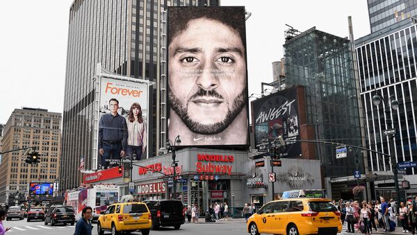 A Nike Ad featuring American football quarterback Colin Kaepernick is on diplay September 8, 2018 in New York City - Sputnik International