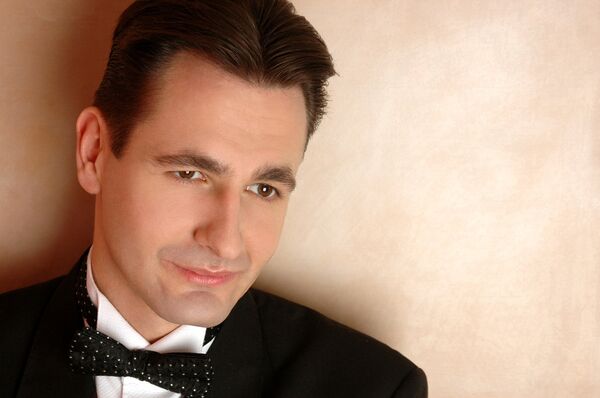 Symphonic Brass Wales musical director Craig Roberts Symphonic Brass Wales musical director Craig Roberts - Sputnik International