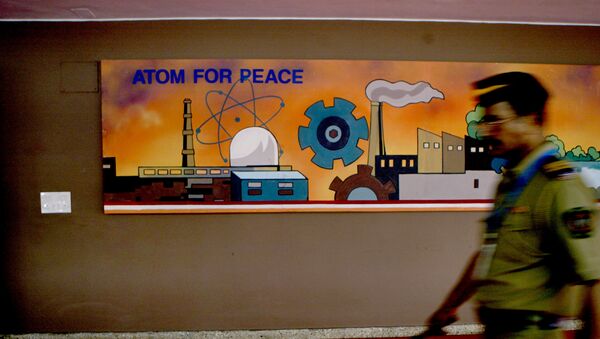 A policeman walks past a mural at the Bhabha Atomic Research Centre (BARC) Training School where Prime Minister Manmohan Singh is visiting, in Mumbai, India, Friday, Aug. 31, 2007. - Sputnik International