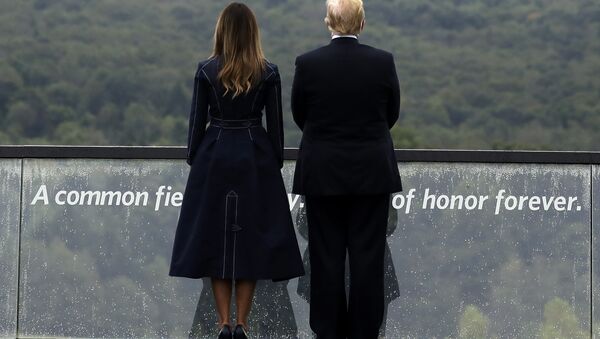 President Donald Trump and first lady Melania Trump, stand along the September 11th Flight 93 Memorial, Tuesday, Sept. 11, 2018, in Shanksville, Pa. - Sputnik International