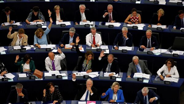 Members of the European Parliament take part in a vote on the situation in Hungary during a voting session at the European Parliament in Strasbourg, France, September 12, 2018 - Sputnik International