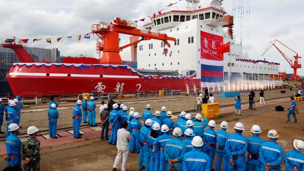People attend the launch ceremony of China's first domestically built polar icebreaker Xuelong 2, or Snow Dragon 2, at a shipyard in Shanghai, China September 10, 2018. - Sputnik International