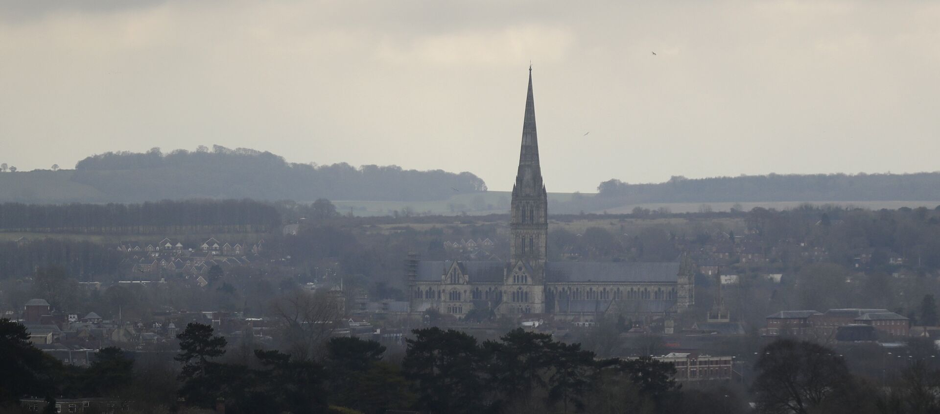 In this Tuesday, March 13, 2018 file photo the combined tower and spire of Salisbury Cathedral stand surrounded by the medieval city where former Russian double agent Sergei Skripal and his daughter were found critically ill following exposure to the Russian-developed nerve agent Novichok in Salisbury, England - Sputnik International, 1920, 04.03.2019
