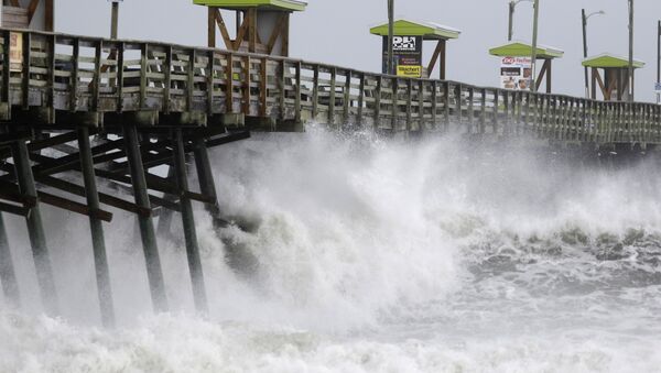Waves from Hurricane Florence pound the Bogue Inlet Pier in Emerald Isle N.C., Thursday, Sept. 13, 2018. - Sputnik International