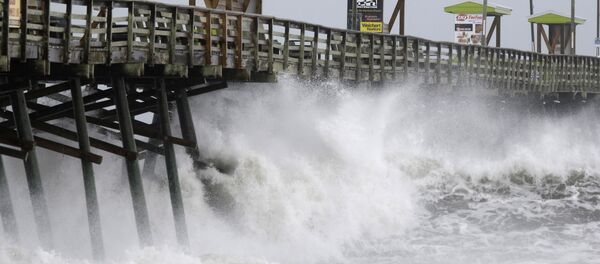 Waves from Hurricane Florence pound the Bogue Inlet Pier in Emerald Isle N.C., Thursday, Sept. 13, 2018. - Sputnik International