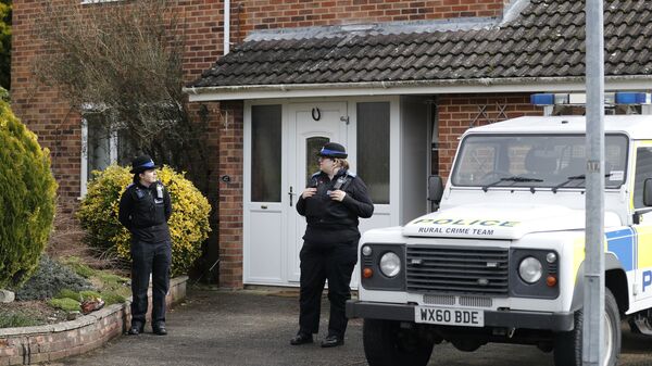  In this Tuesday, March 6, 2018 file photo, police officers stand outside the house of former Russian double agent Sergei Skripal in Salisbury, England.  - Sputnik International