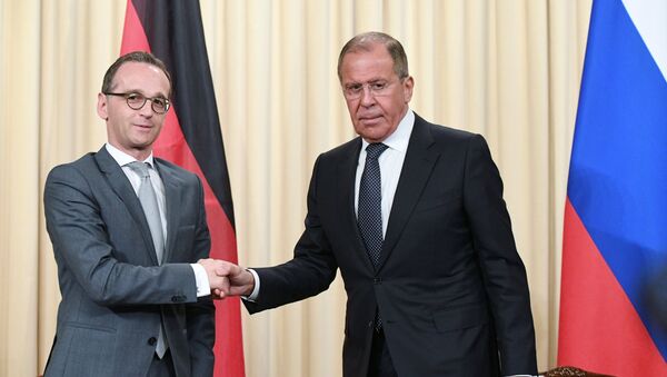 Russian Acting Foreign Minister Sergei Lavrov and German Foreign Minister Heiko Maas, left, at a joint news conference following a meeting at the Russian Foreign Ministry Reception House - Sputnik International