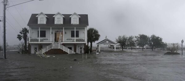 High winds and water surround a house as Hurricane Florence hits Swansboro N.C., Friday, Sept. 14, 2018 - Sputnik International