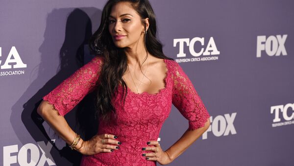 Nicole Scherzinger, a cast member in the reality television series The Masked Singer, turns back for photographers at the FOX Summer TCA All-Star Party at Soho House West Hollywood, Thursday, Aug. 2, 2018, in West Hollywood, Calif (Photo by Chris Pizzello/Invision/AP) - Sputnik International