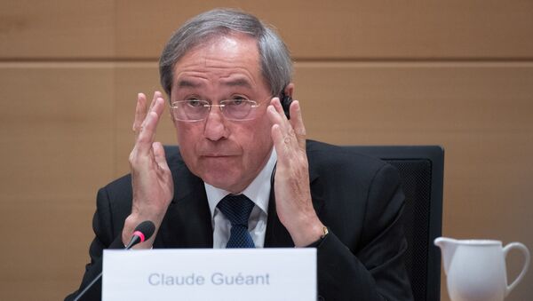 In this file photo taken on May 3, 2017 former French minister Claude Gueant listens during a session of the parliamentary inquiry commission on the plea agreement at the federal parliament in Brussels. French juges investigating the financing of former President Nicolas Sarkozy's 2007 campaign have requested new indictments against his former campaign director Claude Gueant for passive corruption, it was announced on September 17, 2018. - Sputnik International