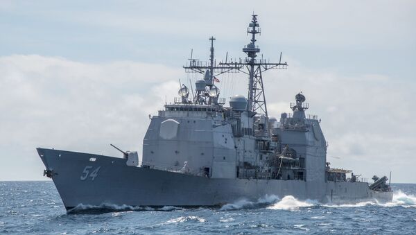 This Mar. 6, 2016, file photo provided by the U.S. Navy, shows the Ticonderoga-class guided-missile cruiser USS Antietam (CG 54) sails in the South China Sea. China says it dispatched warships to identify and warn off a pair of U.S. Navy vessels sailing near one of its island claims in the South China Sea. A statement on the Defense Ministry’s website said the Arleigh Burke class guided-missile destroyer USS Higgins and Ticonderoga class guided-missile cruiser USS Antietam entered waters China claims in the Paracel island group “without the permission of the Chinese government.” - Sputnik International