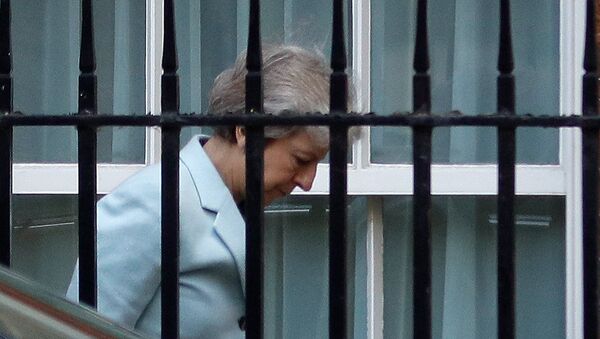 Britain's Prime Minister Theresa May arrives at the back entrance of 10 Downing Street in London, September 21, 2018 - Sputnik International