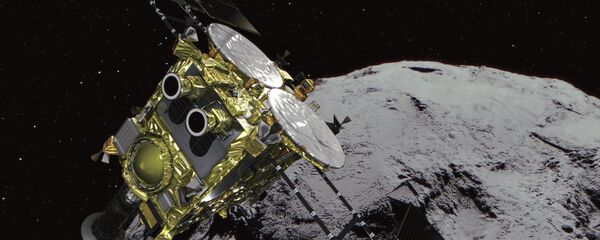 This computer graphics image provided by the Japan Aerospace Exploration Agency (JAXA) shows an asteroid and asteroid explorer Hayabusa2. This computer graphics image provided by the Japan Aerospace Exploration Agency (JAXA) shows an asteroid and asteroid explorer Hayabusa2. - Sputnik International