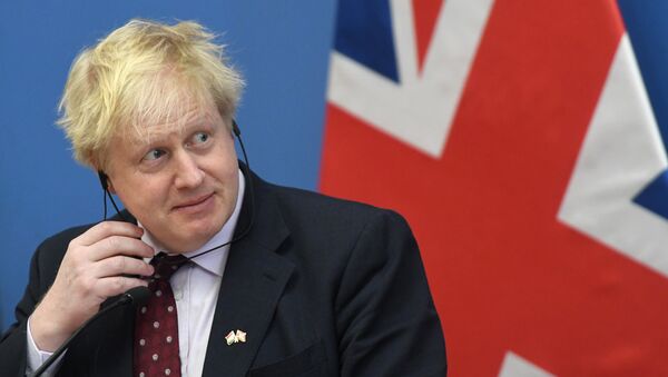 Then British Foreign Minister and leading Brexit supporter Boris Johnson gives a joint press conference with Hungary's Minister of Foreign Affairs and Trade (not in picture) following talks in Budapest on March 2, 2018. - Sputnik International