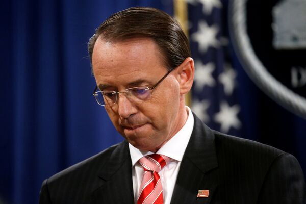 Deputy U.S. Attorney General Rod Rosenstein pauses while announcing grand jury indictments of 12 Russian intelligence officers in special counsel Robert Mueller's Russia investigation, during a news conference at the Justice Department in Washington, U.S., July 13, 2018 Deputy U.S. Attorney General Rod Rosenstein pauses while announcing grand jury indictments of 12 Russian intelligence officers in special counsel Robert Mueller's Russia investigation, during a news conference at the Justice Department in Washington, U.S., July 13, 2018 - Sputnik International