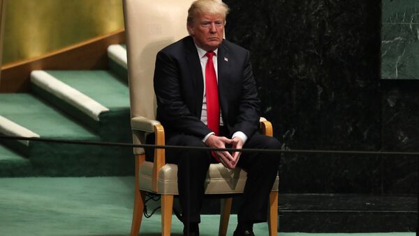 U.S. President Donald Trump sits in the chair reserved for heads of state before delivering his address during the 73rd session of the United Nations General Assembly at U.N. headquarters in New York, U.S., September 25, 2018 - Sputnik International