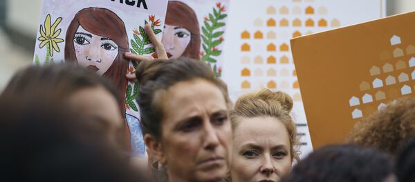 Protesters with Women's March and others hold up signs that read We Won't Go Back as they gather in front of the Supreme Court on Capitol Hill in Washington, Monday, Sept. 24, 2018. Protesters with Women's March and others hold up signs that read We Won't Go Back as they gather in front of the Supreme Court on Capitol Hill in Washington, Monday, Sept. 24, 2018. - Sputnik International