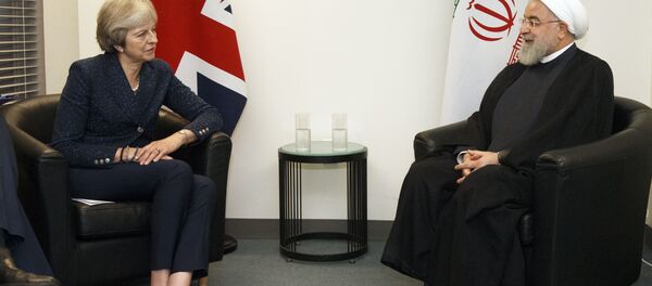 British Prime Minister Theresa May meets with Iranian President Hassan Rouhani on the sidelines of the 73rd session of the United Nations General Assembly at U.N. headquarters, Tuesday, Sept. 25, 2018. British Prime Minister Theresa May meets with Iranian President Hassan Rouhani on the sidelines of the 73rd session of the United Nations General Assembly at U.N. headquarters, Tuesday, Sept. 25, 2018. - Sputnik International