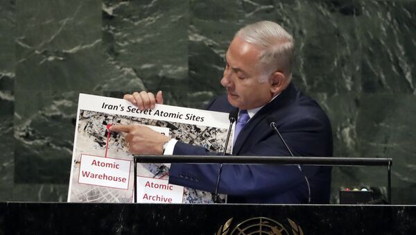 Israel's Prime Minister Benjamin Netanyahu shows an atomic warehouse in Teheran during his address the 73rd session of the United Nations General Assembly, at U.N. headquarters, Thursday, Sept. 27, 2018 - Sputnik International