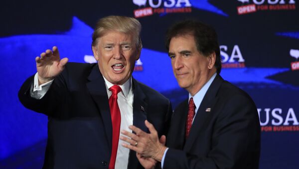 President Donald Trump with Rep. Jim Renacci, R-Ohio, right, waves during a roundtable discussion on tax cuts at Cleveland Public Auditorium and Conference Center in Cleveland, Ohio, Saturday, May 5, 2018. - Sputnik International