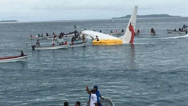 A plane heading toward  Papua New Guinea lands in ocean after overshooting a runway in Micronesia  - Sputnik International