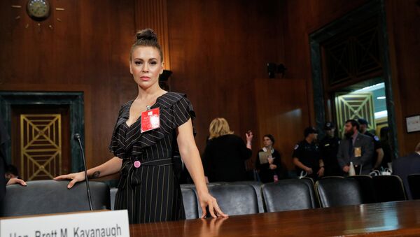 Actor Alyssa Milano stands in the hearing room after the conclusion of testimony before a Senate Judiciary Committee confirmation hearing for Kavanaugh by Professor Christine Blasey Ford, who has accused U.S. Supreme Court nominee Brett Kavanaugh of a sexual assault in 1982, on Capitol Hill in Washington, U.S., September 27, 2018 - Sputnik International