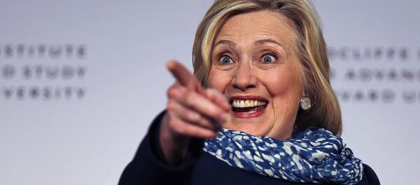 Hillary Clinton points to the audience as she is introduced at Harvard University in Cambridge, Mass., Friday, May 25, 2018. Harvard University's Radcliffe Institute honored Clinton with the 2018 Radcliffe Medal - Sputnik International