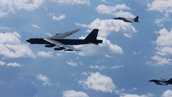 American B-52 bombers conducts bilateral training mission with 12 Koku Jieitai F-15s and 4 F-2s with the Japan Air Self-Defense Force - Sputnik International