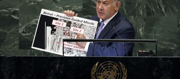 Israel's Prime Minister Benjamin Netanyahu shows guided missile sites in Beirut during his address of the 73rd session of the United Nations General Assembly, at U.N. headquarters, Thursday, Sept. 27, 2018 Israel's Prime Minister Benjamin Netanyahu shows guided missile sites in Beirut during his address of the 73rd session of the United Nations General Assembly, at U.N. headquarters, Thursday, Sept. 27, 2018 - Sputnik International
