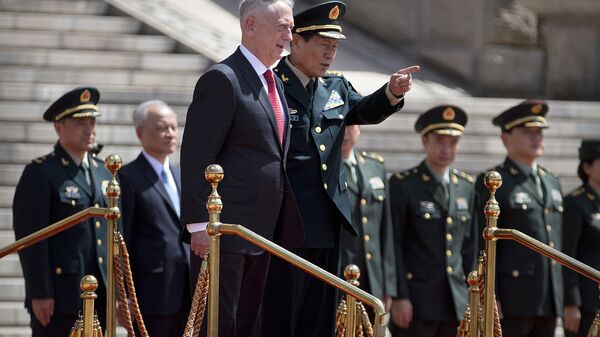U.S. Defense Secretary Jim Mattis, center left, and China's Defense Minister Wei Fenghe stand together during a welcome ceremony at the Bayi Building in Beijing, Wednesday, June 27, 2018 - Sputnik International