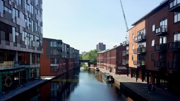 The Mailbox (left) pictured along the Birmingham Canal at the Gas Street Basin. - Sputnik International