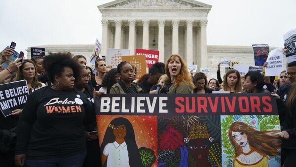 Protesters with Women's March and others gather in front of the Supreme Court on Capitol Hill in Washington, Monday, Sept. 24, 2018. A second allegation of sexual misconduct has emerged against Judge Brett Kavanaugh, a development that has further imperiled his nomination to the Supreme Court, forced the White House and Senate Republicans onto the defensive and fueled calls from Democrats to postpone further action on his confirmation. President Donald Trump is so far standing by his nominee. - Sputnik International