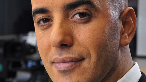 In this photo dated Nov. 22, 2010, notorious French criminal Redoine Faid poses prior to an interview with French all-news TV channel, LCI, as he was promoting his book, in Boulogne-Billancourt, outside Paris, France. Faid serving 25 years for murder made an audacious escape from prison Sunday after a helicopter carrying several heavily armed commandos landed in a courtyard, freed him from a visiting room and carried him away. - Sputnik International