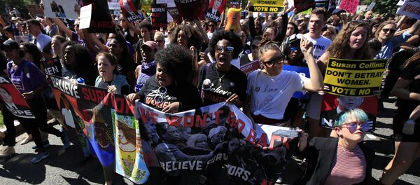 Protesters against Supreme Court nominee Brett Kavanaugh march towards the Supreme Court in Washington, Thursday, Oct. 4, 2018. Protesters against Supreme Court nominee Brett Kavanaugh march towards the Supreme Court in Washington, Thursday, Oct. 4, 2018. - Sputnik International
