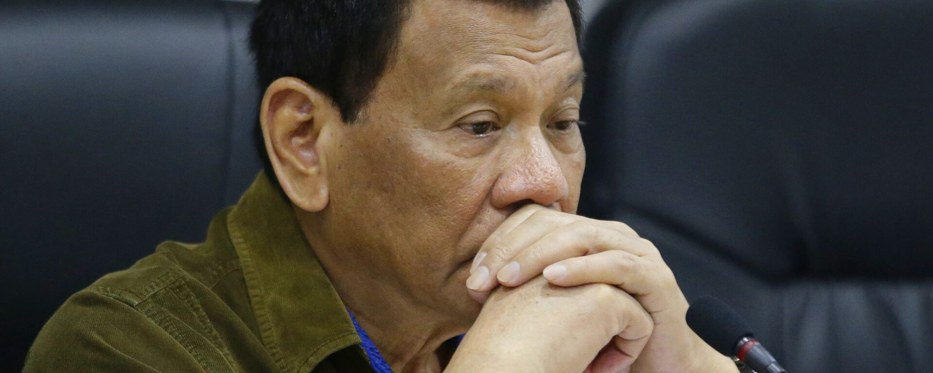 Philippine President Rodrigo Duterte attends a command conference at the National Disaster Risk Reduction and Management Council operations center in metropolitan Manila, Philippines on Thursday, Sept. 13, 2018 - Sputnik International, 1920, 14.03.2025