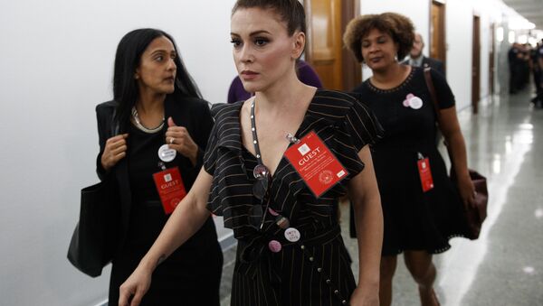 Actress Alyssa Milano walks to a Senate Judiciary Committee hearing after a break on Capitol Hill in Washington, Thursday, Sept. 27, 2018, with Christine Blasey Ford and Supreme Court nominee Brett Kavanaugh - Sputnik International