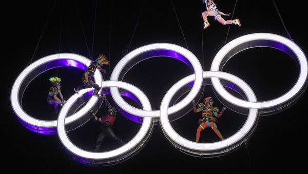 Actors perform high up in the air, inside the Olympic rings during the Opening Ceremony of The Youth Olympic Games, in Buenos Aires, Argentina, Saturday, Oct. 6, 2018. - Sputnik International