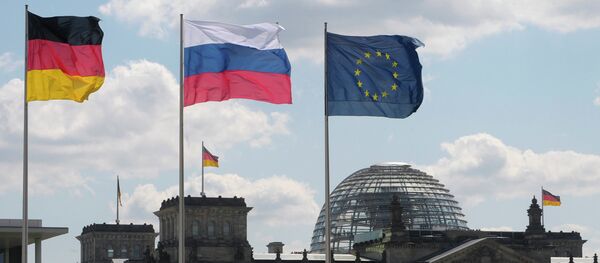 From left to right: Flags of Germany, Russia and the EU From left to right: Flags of Germany, Russia and the EU - Sputnik International