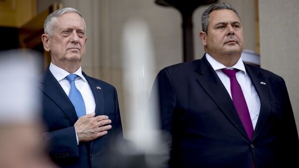 Defense Secretary Jim Mattis, left, and Greek Defense Minister Panagiotis Kammenos, right, stand as national anthems are played during an enhanced honor cordon at the Pentagon, Tuesday, Oct. 9, 2018, in Washington. - Sputnik International