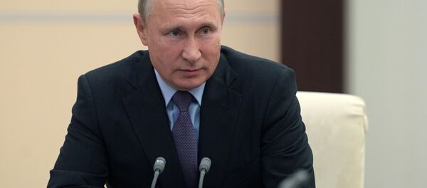 Russian President Vladimir Putin during a meeting with permanent members of Russia's Security Council on October 12, 2018 Russian President Vladimir Putin during a meeting with permanent members of Russia's Security Council on October 12, 2018 - Sputnik International